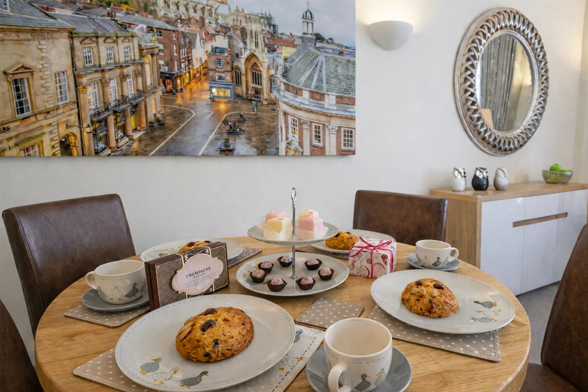 Hunter House Apartment dining table set for afternoon tea in York city centre
