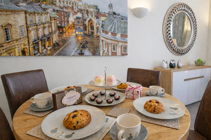 Hunter House Apartment dining table set for afternoon tea in York city centre