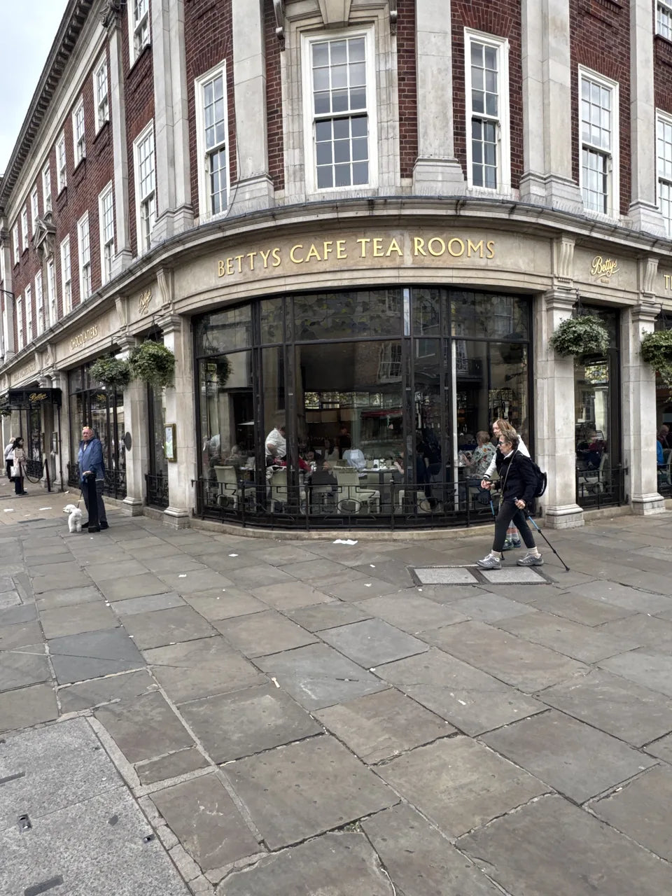 The curved windows and sign of Bettys Café Tea Rooms in St Helen’s Square