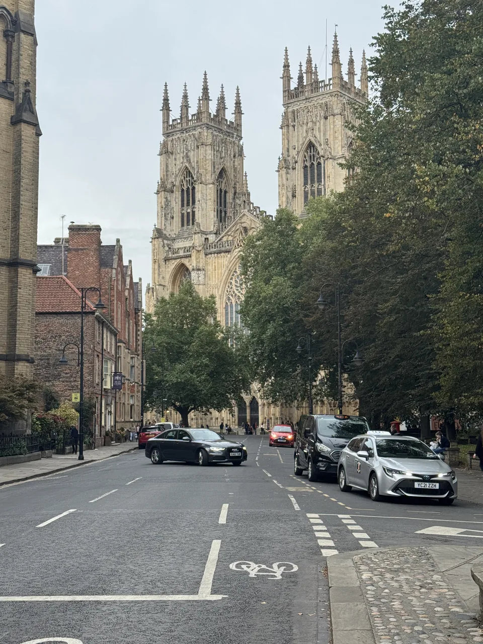 The west towers of York Minster above Duncombe Place and its trees