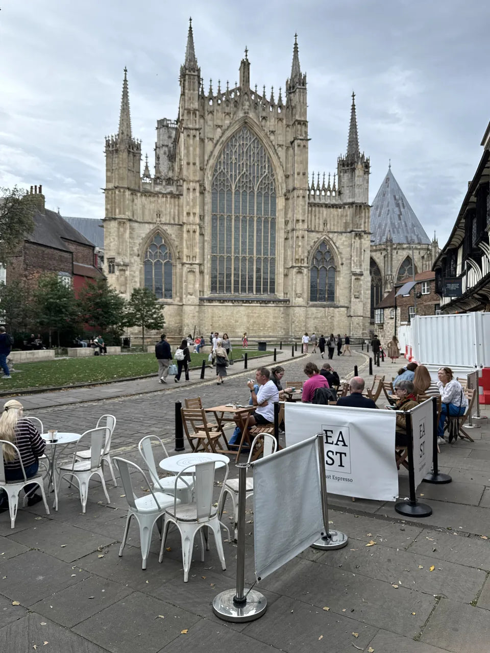 York Minster’s south transept with café tables in the foreground